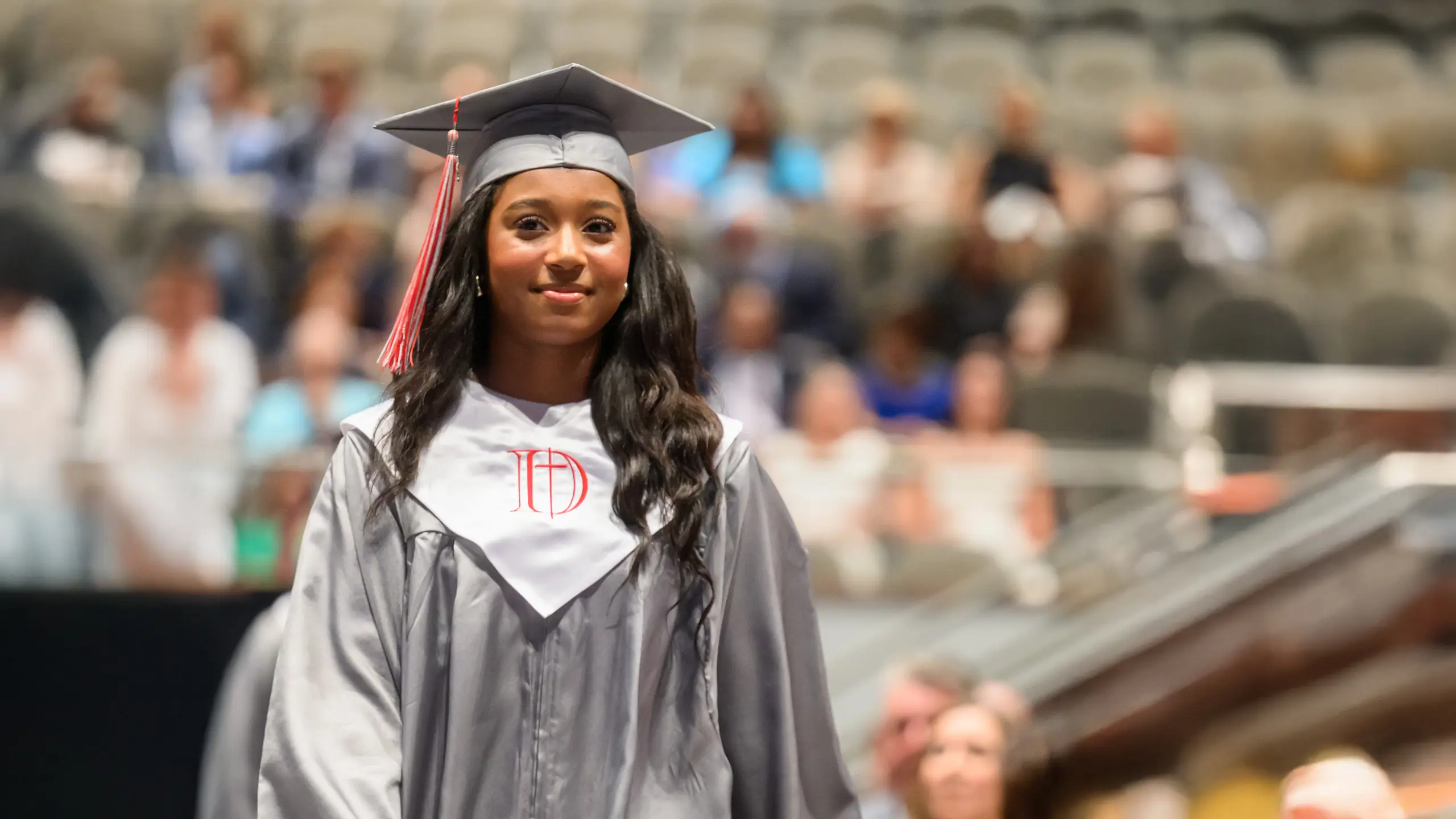 Dunham graduate walking