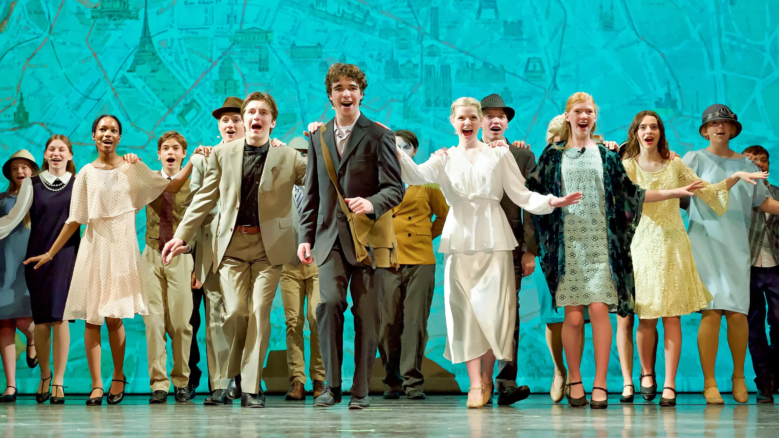 Upper school theater students performing in Anastasia musical.
