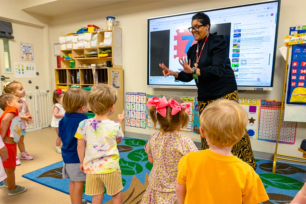 Early childhood students learning in classroom.