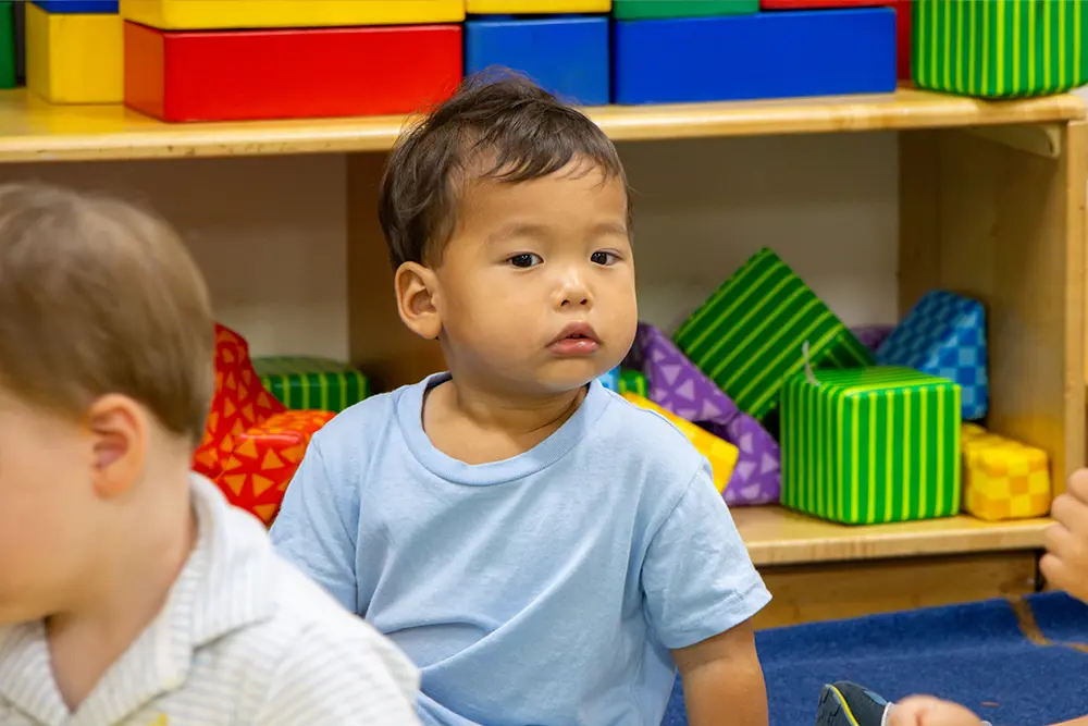 Early childhood student learning in classroom
