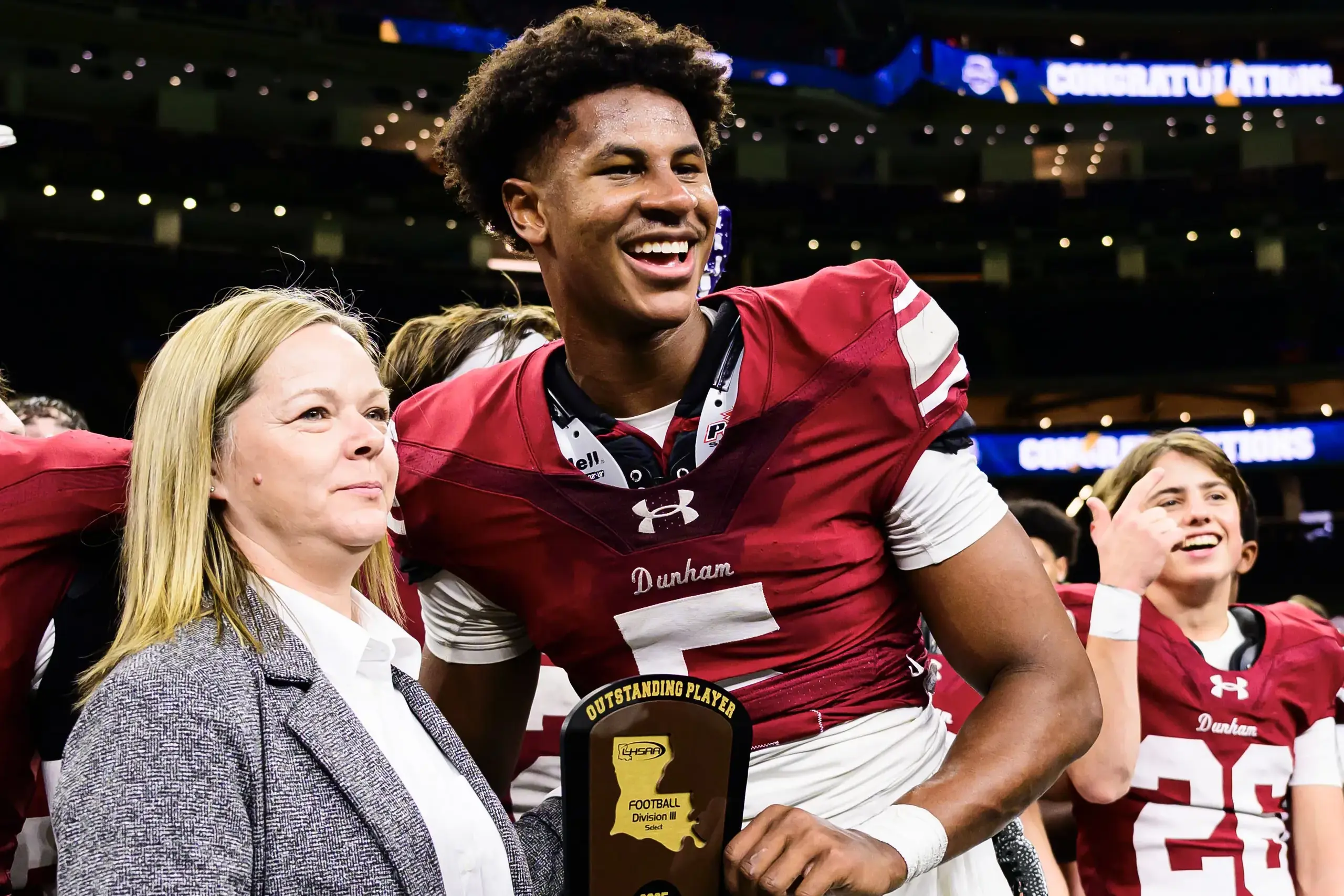 Dunham football star Elijah Haven from Baton Rouge, Louisiana, receives the outstanding player award after leading the team to a 2025 LHSAA State Championship win in the Superdome.In Page Content without Navigation,athletics,football,news
