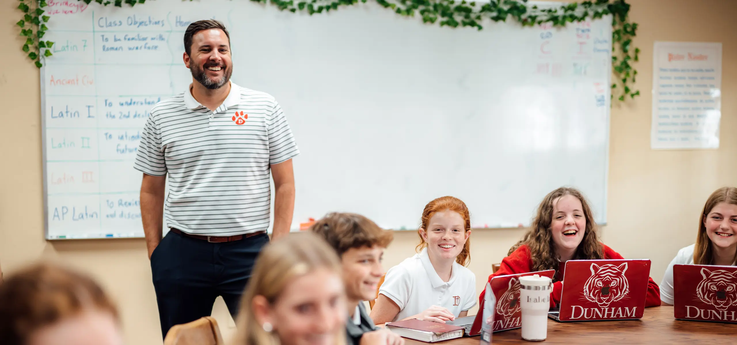 Dunham teacher and students around a Harkness table.