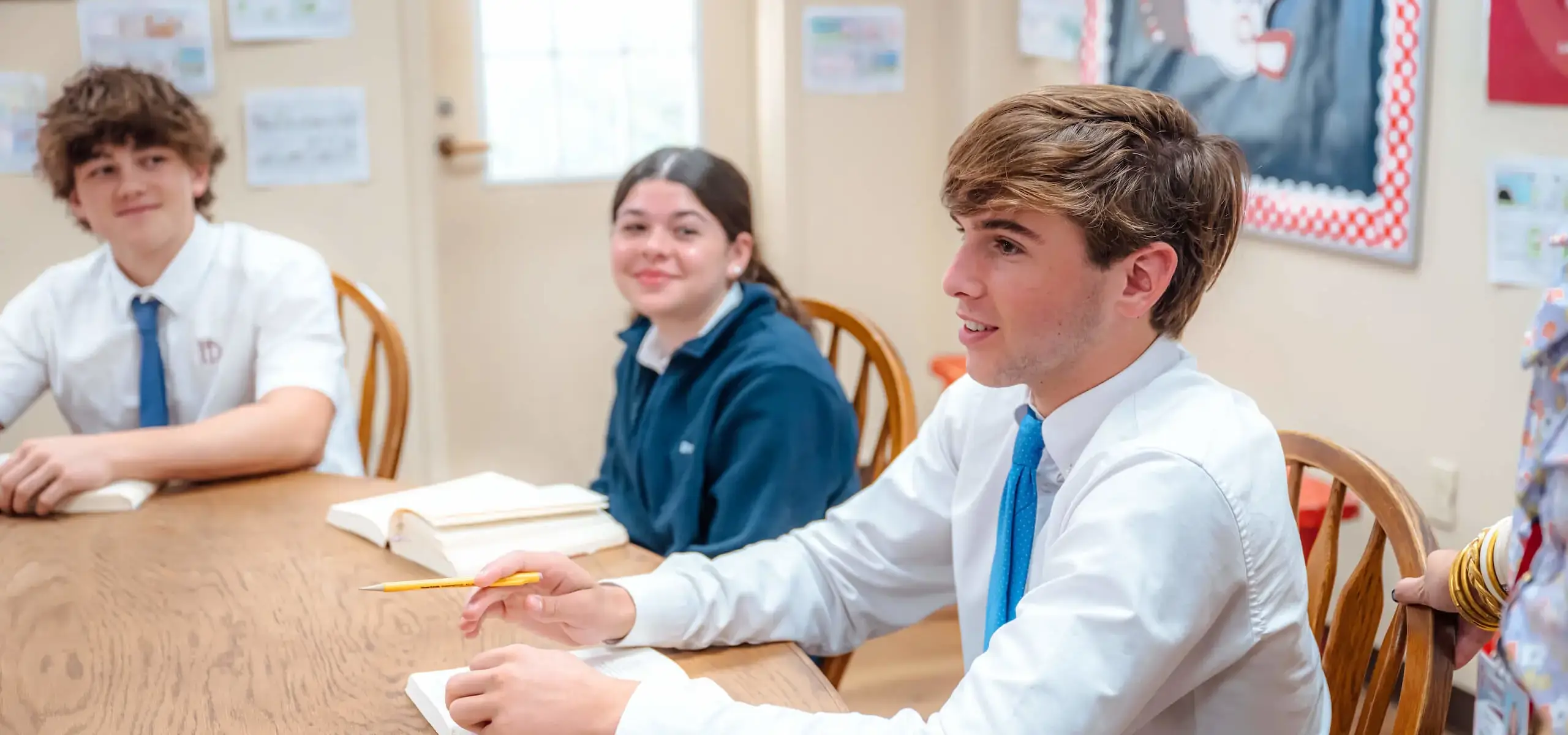 Dunham students engaged in a Harkness discussion