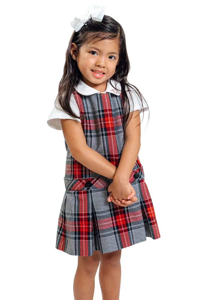 Female lower school student smiling.